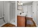 Spacious bathroom features a walk-in shower, double vanity, and tile flooring at 8422 S Ault Ln, Morrison, CO 80465