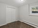 Small bedroom with closet and single window at 8422 S Ault Ln, Morrison, CO 80465
