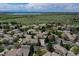 Idyllic neighborhood nestled near a serene lake and bordered by lush green spaces at 13950 E Chenango Dr, Aurora, CO 80015