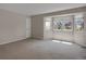 Spacious bedroom with neutral carpet and large windows offering ample natural light at 13950 E Chenango Dr, Aurora, CO 80015