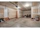 Spacious garage offers ample room for parking and storage with an automatic garage door at 13950 E Chenango Dr, Aurora, CO 80015