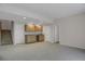 Entertainment space with sink/cabinet area offers great potential for Gathering enjoyment and hosting at 13950 E Chenango Dr, Aurora, CO 80015