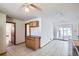 The kitchen opens to a casual dining area with sliding door access to the outdoor patio at 2525 S Ivanhoe Pl, Denver, CO 80222