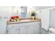 Updated bathroom features new vanity and faucet, and fresh paint at 3513 Quitman St, Denver, CO 80212
