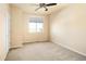 Bright and airy bedroom with a large window, neutral carpet, and a calming atmosphere for restful nights at 5562 W 72Nd Pl, Westminster, CO 80003