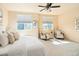 Comfortable bedroom with neutral decor and plenty of sunlight, perfect for relaxing and unwinding at 5562 W 72Nd Pl, Westminster, CO 80003