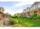 Attractive townhouse exteriors feature well-manicured lawns and mature landscaping, enhancing curb appeal at 5562 W 72Nd Pl, Westminster, CO 80003