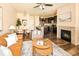 Open living space featuring a living room, dining area, and modern kitchen with stainless appliances at 5562 W 72Nd Pl, Westminster, CO 80003
