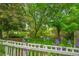 Backyard view overlooking a pond and green space in a peaceful neighborhood setting at 2840 S Kenton Ct, Aurora, CO 80014