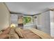 Bedroom boasts built-in shelving, work space by the window, with great natural lighting at 2840 S Kenton Ct, Aurora, CO 80014