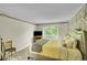 Bright bedroom features a large window and a comfy bed at 2840 S Kenton Ct, Aurora, CO 80014
