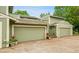 Charming townhome with a two-car garage and a well-manicured front yard, ready for its new owners at 2840 S Kenton Ct, Aurora, CO 80014