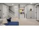 Finished basement space featuring neutral carpet, stylish decor and provides extra living space at 15960 W 62Nd Dr, Arvada, CO 80403