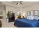 Serene main bedroom with a spacious layout and connected bathroom at 15960 W 62Nd Dr, Arvada, CO 80403