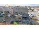 Two-story house with backyard patio, aerial view at 1781 Chestnut Ave, Erie, CO 80516