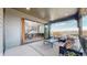 Covered patio with sliding glass doors opening to the dining area, offering indoor/outdoor living at 1781 Chestnut Ave, Erie, CO 80516