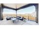 Spacious covered patio with seating area and views of the surrounding neighborhood at 1781 Chestnut Ave, Erie, CO 80516
