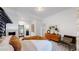 Bright basement bedroom with mid-century modern dresser at 1781 Chestnut Ave, Erie, CO 80516