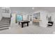 Finished basement with a pool table and bar area at 1781 Chestnut Ave, Erie, CO 80516