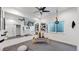 Home gym with mirror, barre, and various equipment at 1781 Chestnut Ave, Erie, CO 80516