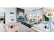 Living room with fireplace and access to balcony at 1781 Chestnut Ave, Erie, CO 80516