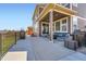 Outdoor patio with comfortable seating, a grill, perfect for relaxing and entertaining at 9574 Keystone Trl, Parker, CO 80134
