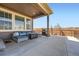 Outdoor patio with comfortable seating, a grill, and a view of the community at 9574 Keystone Trl, Parker, CO 80134