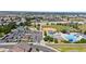 Aerial view of Parker's recreation area, showcasing a pool, baseball field, and ample parking at 10814 Bayfield Way, Parker, CO 80138