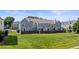 Townhome community featuring lawn space and fenced patios at 10814 Bayfield Way, Parker, CO 80138