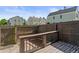Fenced backyard with a patio, wooden deck, and shade at 10814 Bayfield Way, Parker, CO 80138