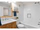 Bathroom with modern fixtures, tile surround, and soaking tub at 10814 Bayfield Way, Parker, CO 80138