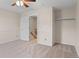 Cozy bedroom with neutral walls, carpet flooring, and closet space at 10814 Bayfield Way, Parker, CO 80138