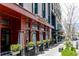 Upscale restaurant exterior with outdoor seating, stylish lighting, and lush planters at 3330 E 4Th Ave, Denver, CO 80206