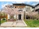 Beautiful home exterior featuring well-manicured landscaping and charming trees at 99 S Albion St, Denver, CO 80246