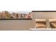 Relaxing rooftop deck area with a view of the city and mountains in the background at 99 S Albion St, Denver, CO 80246