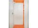 Modern shower with white tile, orange accents, and a rainfall showerhead at 99 S Albion St, Denver, CO 80246