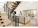 Floating staircase with metal railings leading to the living area at 99 S Albion St, Denver, CO 80246