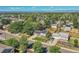 Charming home boasts solar panels, a manicured lawn, and a convenient location in a tree-lined neighborhood at 5183 Durham Ct, Denver, CO 80239