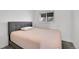Comfortable bedroom featuring plush bedding, natural light, and cozy ambiance at 5183 Durham Ct, Denver, CO 80239