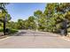 A wrought iron security gate at the community's entrance provides privacy and exclusivity at 9 Roder Gate Ln, Castle Pines, CO 80108