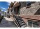 Exterior view of the building with brick and stonework at 1355 Gaylord St # 6, Denver, CO 80206