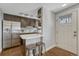 Efficient kitchen design featuring modern appliances and a convenient breakfast bar at 1355 Gaylord St # 6, Denver, CO 80206