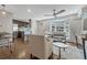 Open-concept living space connects to a modern kitchen with a breakfast bar at 1355 Gaylord St # 6, Denver, CO 80206