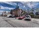 Exterior shot of parking lot with a view of the multi-Gathering building at 1355 Gaylord St # 6, Denver, CO 80206