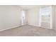 Cozy bedroom with carpet, two windows with curtains, and a serene ambiance at 22921 E Union Ave, Aurora, CO 80015