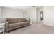 Upstairs bedroom with carpet, neutral walls and a comfortable couch at 22921 E Union Ave, Aurora, CO 80015