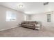 Cozy living room with neutral carpeting and furniture at 22921 E Union Ave, Aurora, CO 80015
