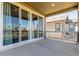 Spacious covered patio with sliding glass doors offers seamless indoor-outdoor transition at 22921 E Union Ave, Aurora, CO 80015