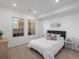 Bright bedroom with cozy carpet, light color palette, and large windows at 975 N Lincoln St # 3H, Denver, CO 80203
