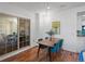 Dining room with elegant chandelier and natural light, hardwood flooring at 975 N Lincoln St # 3H, Denver, CO 80203